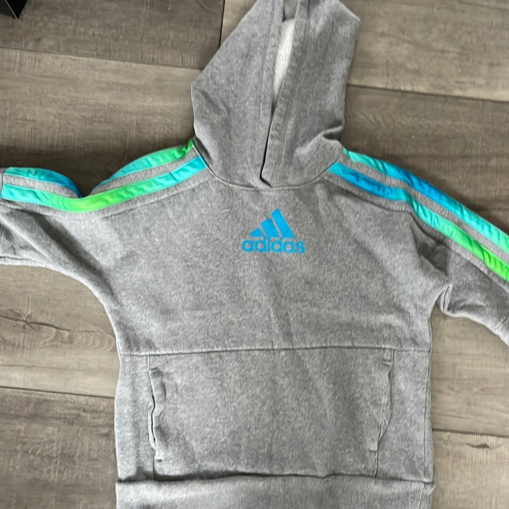Well loved adidas hoodie. Size medium